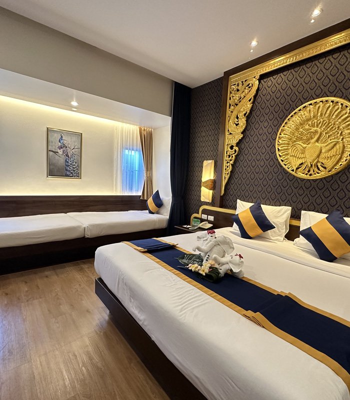 Superior Royal Blue Wing room with gold peacock medallion